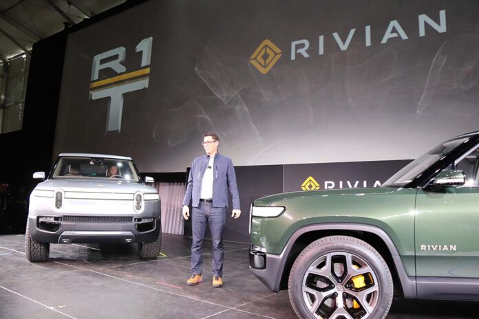 Rivian-R1T-and-R1S-with-Scaringe.jpg